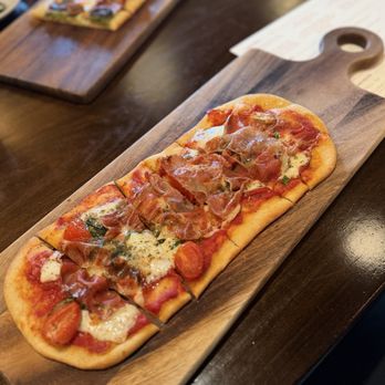 The Library - Margherita flatbread with prosciutto - Wine Bars Near Me - Houston, Texas The Library - Margherita flatbread with prosciutto - Wine Bars Near Me - Houston, Texas