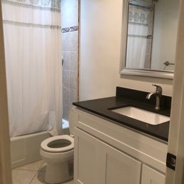 New drywall, vanity, and mirror.