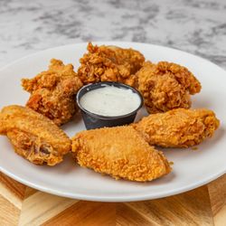 Tomatoes II Pizzeria - Wings
Served with ranch dressing.