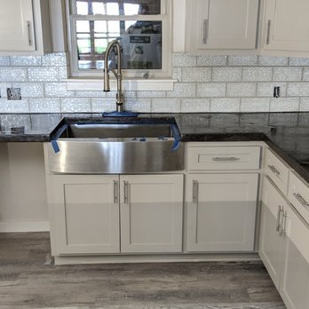 Remodeling by Juan - New kitchen backsplash, cabinets, concrete countertops, farm sink,vinyl floors for all your home needs - General Contractors Near Me - Cypress, Texas