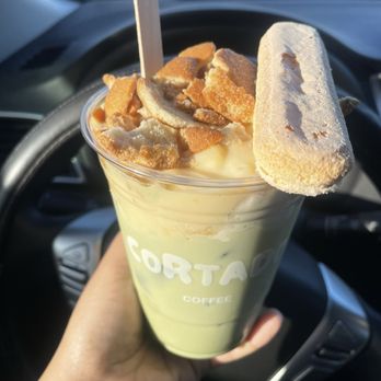 Cortado Coffee - Iced matcha banana pudding latte - Coffee & Tea Near Me - Garden Grove, California