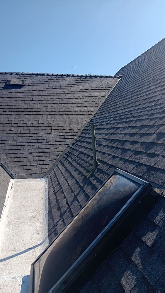 Slide of R Squared Roofing Services