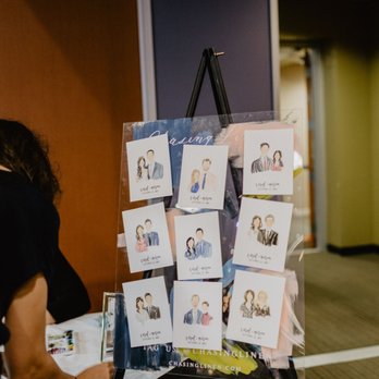 Chasing Linen - Each portrait is slipped in a clear plastic bag. these are taped onto their display easel with painters tape! Photo: Julien Lee Photography - Graphic Design Near Me