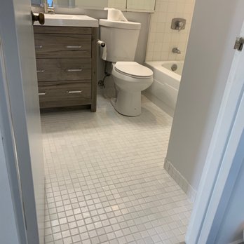 Sir Grout Chicago - The bathroom floor tiles look practically new after the service. - Refinishing Services Near Me - Chicago, Illinois Sir Grout Chicago - The bathroom floor tiles look practically new after the service. - Refinishing Services Near Me - Chicago, Illinois