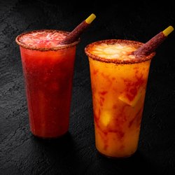 Sweet, spicy & refreshing! Choose cucumber-lime or pineapple with chamoy, Tajín, pepper & a tamarindo candy stick.