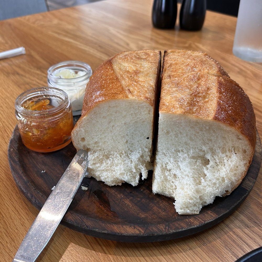 Bigfire - Bread loaf with orange peach marmalade and savory butter 7/9/25 - American Near Me - Orlando, Florida Bigfire - Bread loaf with orange peach marmalade and savory butter 7/9/25 - American Near Me - Orlando, Florida
