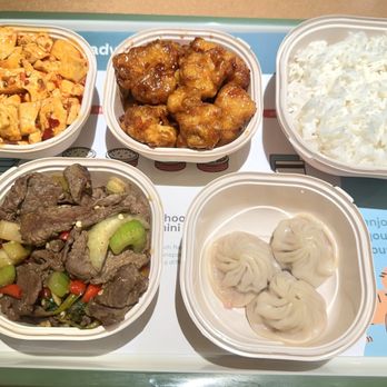 Tigawok - GF gluten free: Mapo tofu, Orange chicken, rice, Hunan beef. Not gluten free: soup dumpling - Chinese Near Me - Irvine, California Tigawok - GF gluten free: Mapo tofu, Orange chicken, rice, Hunan beef. Not gluten free: soup dumpling - Chinese Near Me - Irvine, California