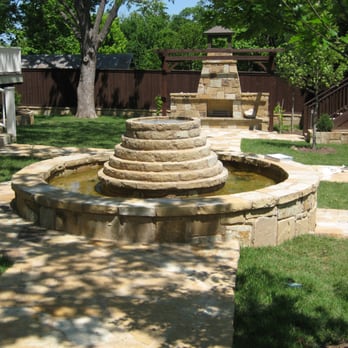 Reliable Outdoor Living - a fountain in a backyard - General Contractors Near Me Reliable Outdoor Living - a fountain in a backyard - General Contractors Near Me