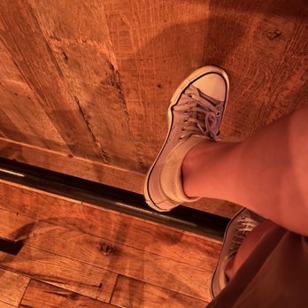 Nic & Norman's - Comfortable bar seating with a foot bar. - American Near Me - Louisville, Kentucky