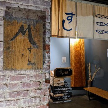 M Sushi - Outside. Storefront. Business hours on window. Small lobby. - Sushi Bars Near Me - Durham, North Carolina