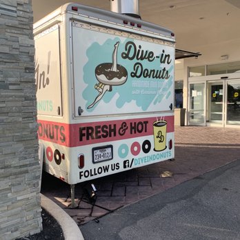 Dive-In Donuts - a food truck parked in front of a building - Food Trucks Near Me