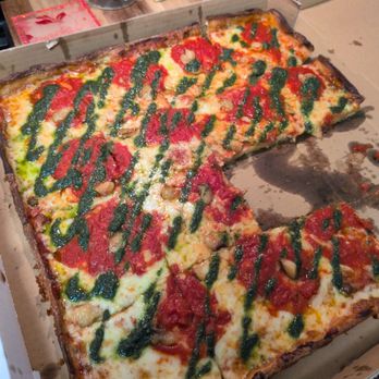 Pizzarella Grille - Grandma Pizza. Thin crust, roasted garlic, tomatoes, pesto and mozz. - Pizza Near Me - Bryn Mawr, Pennsylvania Pizzarella Grille - Grandma Pizza. Thin crust, roasted garlic, tomatoes, pesto and mozz. - Pizza Near Me - Bryn Mawr, Pennsylvania