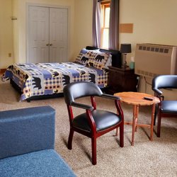 Cold River Campground - Bear Lodge living room. A great option for those who want the camping experience but love the creature comforts. Linen and coffee included.