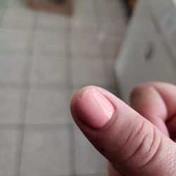 Red Persimmon Nails & Spa - Chipped nail a day after a gel manicure on healthy nails.