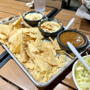 Condado Tacos - Three Buds - Half Size. House Salsa. Smoked Cheddar Queso. Dirty Queso. - Tacos Near Me - Noblesville, Indiana Condado Tacos - Three Buds - Half Size. House Salsa. Smoked Cheddar Queso. Dirty Queso. - Tacos Near Me - Noblesville, Indiana