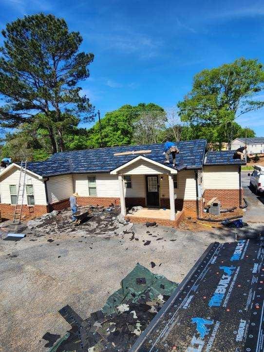 Slide of TTS Roofing & Contracting