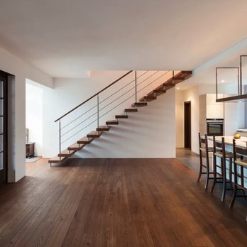 Superior Renovations - a kitchen with a staircase leading to the second floor - Flooring Near Me Superior Renovations - a kitchen with a staircase leading to the second floor - Flooring Near Me