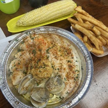 Crab and Seafood Shack - Broiled seafood platter. Halibut, shrimp, scallops, crab cake, & clams - Seafood Near Me - Wildwood, New Jersey Crab and Seafood Shack - Broiled seafood platter. Halibut, shrimp, scallops, crab cake, & clams - Seafood Near Me - Wildwood, New Jersey