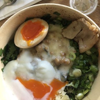 Wadaya - My messy cheese mazemen stole half of the ramen egg from the deluxe. Look how orange that yolk is? - Ramen Near Me - Costa Mesa, California