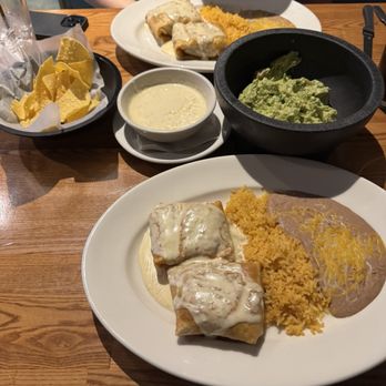 1900 Mexican Grill - Shredded Beef Chimichanga, Guacamole, Queso - Cocktail Bars Near Me - Charlotte, North Carolina 1900 Mexican Grill - Shredded Beef Chimichanga, Guacamole, Queso - Cocktail Bars Near Me - Charlotte, North Carolina
