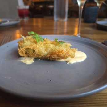 Puritan & Company - A squash flower stuffed with cheese and prosciutto - New American Near Me - Cambridge, Massachusetts
