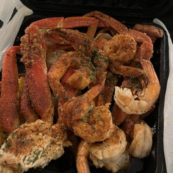 This is Seafood - Shrimp and crablegs tray - New American Near Me - Clinton, Maryland This is Seafood - Shrimp and crablegs tray - New American Near Me - Clinton, Maryland