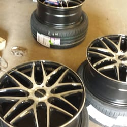 Rochez E & D Auto Repair - 20in rims getting put on!