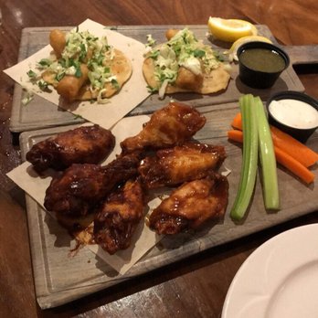 Fireside Tavern - Fish tacos (gone in two bites each - not worth the $6 price tag, even during HH) and wings (that joke of a dish cost $8 during HH) - Bars Near Me - Costa Mesa, California