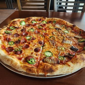 Texapolitan Pizza - Half Pepperoni & Jalapeños, Half Smoked Pork Belly & Jalapeños -- the perfect blend of classic spice and smoky indulgence. - Pizza Near Me - Plano, Texas Texapolitan Pizza - Half Pepperoni & Jalapeños, Half Smoked Pork Belly & Jalapeños -- the perfect blend of classic spice and smoky indulgence. - Pizza Near Me - Plano, Texas