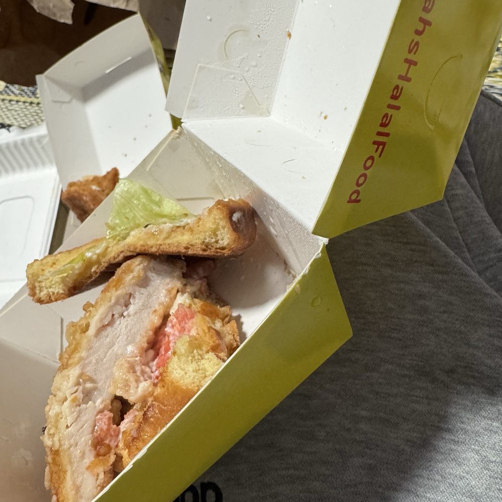 Raw chicken sandwich. Raw chicken sandwich.