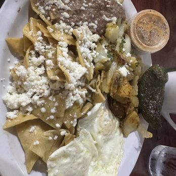 Rodeo Cafe - Chilaquiles with green verde sauce, over easy eggs, rodeo potatoes, and beans - Cafes Near Me - Rancho Cucamonga, California