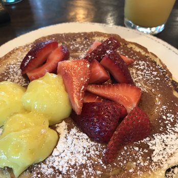 First Watch - Ricotta pancakes with lemon custard fresh strawberries - Breakfast & Brunch Near Me - Davenport, Florida