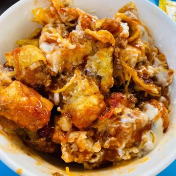 Woody's Lunch Box - "Totchos" all mixed up. I just needed a bit more chili and sour cream - Sandwiches Near Me - Lake Buena Vista, Florida Woody's Lunch Box - "Totchos" all mixed up. I just needed a bit more chili and sour cream - Sandwiches Near Me - Lake Buena Vista, Florida