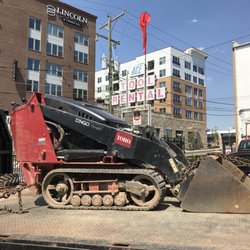 Ace Tool and Equipment Rental - Compact Utility Loader with lots of attachments.