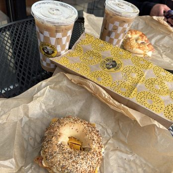 Einstein Bros. Bagels - Fresh Bagels egg Bacon & Cheddar Egg Sandwich w/ice coffee - Breakfast & Brunch Near Me - Buford, Georgia