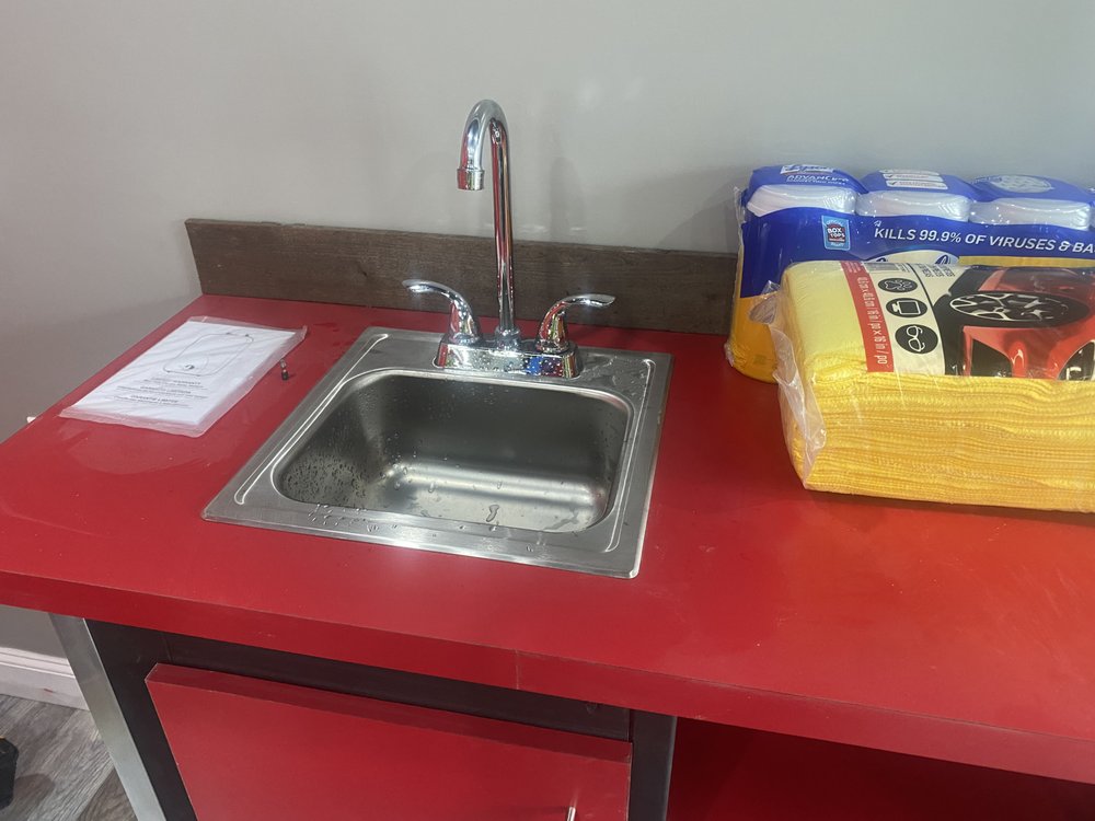 Slide of The in and out plumbing guy