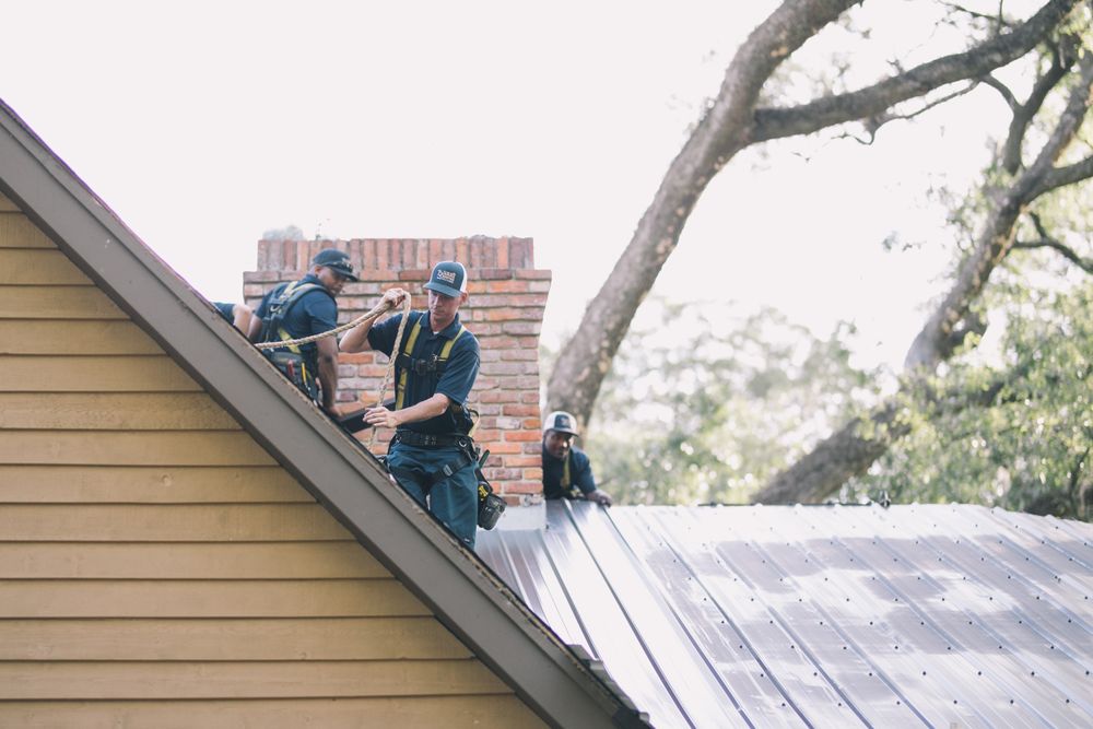 Slide of Tadlock Roofing