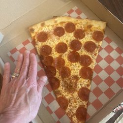 Decent Pizza - A beautiful slice (hand pic for scale )