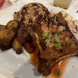 Pork chops with coconut rice & beans and plantains