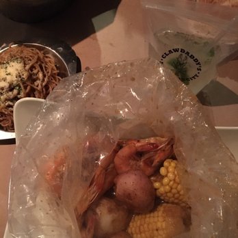 Claw Daddy's - Head-On shrimp Louisiana boil with Cajun sauce and garlic noodles on the side. - Cajun/Creole Near Me - New York, New York Claw Daddy's - Head-On shrimp Louisiana boil with Cajun sauce and garlic noodles on the side. - Cajun/Creole Near Me - New York, New York