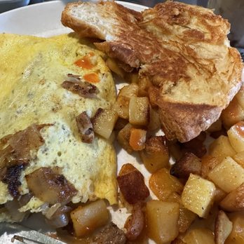 Cafe Madison - Basic Omelet with sausage, Swiss cheese, and caramelized onions Home Fries Side and Croissant - New American Near Me - Albany, New York Cafe Madison - Basic Omelet with sausage, Swiss cheese, and caramelized onions Home Fries Side and Croissant - New American Near Me - Albany, New York