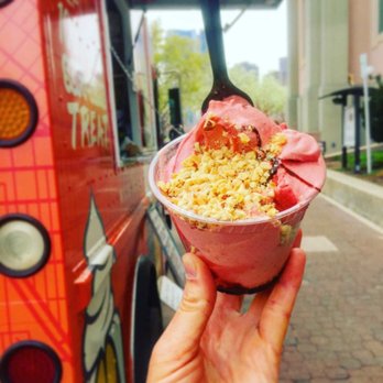 Ba-NOM-a-NOM - shows a person holding a bowl of ice cream - Food Trucks Near Me