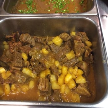Sabor Do Brasil - Beef stew and refried beans comes with rice - Brazilian Near Me - Brighton, Massachusetts