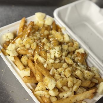 Kuku’s Chicken - Signature Classic Poutine
Crispy golden fries topped with real cheese curds and rich, savory gravy - a true Canadian classic. - Chicken Wings Near Me - Burlington, Ontario Kuku’s Chicken - Signature Classic Poutine
Crispy golden fries topped with real cheese curds and rich, savory gravy - a true Canadian classic. - Chicken Wings Near Me - Burlington, Ontario