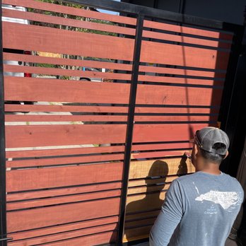 Handyman Gutierrez - In the process of staining side gate - Handyman Near Me