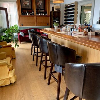 Lunada Garden Bistro - Luanda's cool bar. They have a cozy red couch towards the back and a huge wine selection. - Breakfast & Brunch Near Me - Cayucos, California Lunada Garden Bistro - Luanda's cool bar. They have a cozy red couch towards the back and a huge wine selection. - Breakfast & Brunch Near Me - Cayucos, California