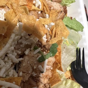 Fuzzy's Taco Shop - One of many pieces of cilantro.  Fajita Chicken Salad - Tacos Near Me - Windsor, Colorado