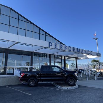 Performance Ford - Outside area where you'll most likely be walking in. (It was a windy day) - Car Dealers Near Me - West Covina, California Performance Ford - Outside area where you'll most likely be walking in. (It was a windy day) - Car Dealers Near Me - West Covina, California
