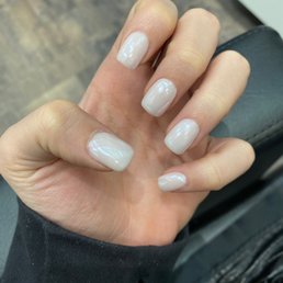 Soft white acrylic nails with magic white chrome on top