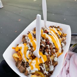 Philly Cheesesteak fries from the food truck Philly Cheesesteak fries from the food truck